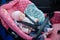 Newborn sleeping in car seat.Safety concept. Infant baby girl. secure driving with children. Baby care lifestyle. Cute baby