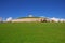 Newgrange prehistoric monument, a large circular mound with an inner stone passageway & chambers in County Meath, Ireland