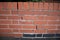 Newly constructed brick wall with subsidence damage visible cracking