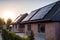 Newly constructed homes with solar panels on the roof.