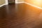 Newly Installed Brown Laminate Flooring and Baseboards in Home