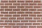 Newly laid red brick wall