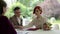 newly made bride sign marriage agreement ceremony with beautiful red-hair. man enters into marriage with woman by mutual