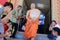 Newly ordained Buddhist monk pray with priest procession