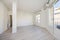 Newly painted empty room with wooden floors, floor-to-ceiling viewpoints