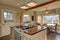 Newly renovated Kitchen and breakfast nook with wood beams on c