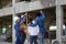 Newly wed couple is meeting with engineering contractor at their under construction house to inspect the building progress and