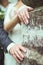 Newly wed couple\'s hands with wedding rings