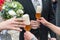 A newlywed bridal couple gets a glass of beer to drink, Germany