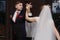 Newlywed couple first dance at ballroom, bride and groom dancing