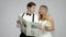 Newlywed couple reading a newspaper