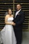 Newlywed couple in wine cellar