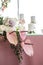 Newlyweds banquet pink table decorated with fresh flowers and candles. Wedding decoration concept