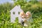 Newlyweds figurine of married couple moving in house