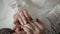 Newlyweds hands. Bride and groom touch each other. Happy wedding couple family in love