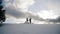 Newlyweds. Lovely young groom and bride go together on top of the mountain, Winter, mountains Wedding couple. Happy