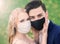 Newlyweds after marriage registration in masks, during a coronavirus infection