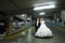 Newlyweds standing in garage