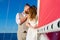 Newlyweds traveling in a sailing boat