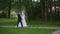 Newlyweds walk in the park