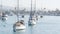 Newport beach harbor, weekend marina resort with yachts and sailboats, Pacific Coast, California, USA. Waterfront luxury suburb