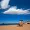 Newport pier beach with lifeguard tower in California