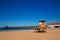 Newport pier beach with lifeguard tower in California