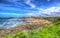 Newquay surfing beach Cornwall uk in colourful hdr with cloudscape