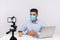 News anchor in medical mask broadcasting about coronavirus, declaring quarantine, 2019-ncov pandemic, making video