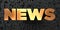 News - Gold text on black background - 3D rendered royalty free stock picture