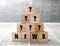 News title and question marks on square wooden blocks on a newspaper background