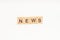 NEWS words on wooden blocks. Wooden cubes word news concept