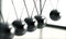 Newtons Cradle Energy Conservation