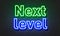 Next level neon sign on brick wall background.