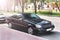 Nezhin, Ukraine - June 15, 2018: Black Mercedes-Benz C140 SL parked in the city center. Luxury black car