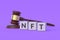 NFT inscription on cubes near judge gavel. Non-fungible token