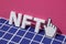 NFT letters symbol 3D text and pixel mouse cursor finger pointer. Minimal concept of blockchain and cryptocurrency