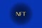 NFT nonfungible token text in the center of the spiral of glowing dots on dark blue background