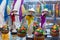 NHA TRANG, VIETNAM - APRIL 19, 2019: Figurine of a girl in a Vietnamese hat and with baskets of fruits in the store