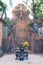 NHA TRANG, VIETNAM - APRIL 21, 2019: Altar with offerings and flowers and a staircase to the red brick monument