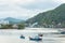 Nha Trang, Vietnam: Cai River with fishermen` blue boats