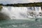 Niagara fall Horseshoe. Ontario. Beautiful waterfall on blue sky and white clouds background.