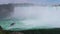 Niagara Falls - Horseshoe falls. A cruise ship with tourists sails down the river. Nature landscape, traveling America. Niagara,