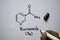 Niaoinamide B3 molecule written on the white board. Structural chemical formula. Education concept