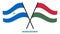 Nicaragua and Hungary Flags Crossed And Waving Flat Style. Official Proportion. Correct Colors