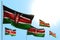 Nice 5 flags of Kenya are wave against blue sky image with bokeh - any celebration flag 3d illustration