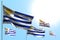 Nice 5 flags of Uruguay are wave against blue sky image with bokeh - any celebration flag 3d illustration