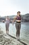 Nice active women exercising together on the beach