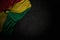 Nice any occasion flag 3d illustration - dark illustration of Ghana flag with big folds on black stone with empty place for