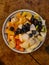 nice arranged fruits on a plate, pears, kiwi, mango, blueberries